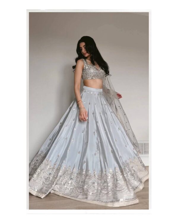 Silver Mist Satin Silk Lehenga Set Silver Mist Satin Silk Lehenga Set with sequins zari and dori work, silver party wear lehenga with net dupatta