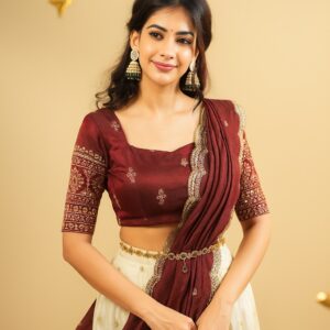 Designer pure crepe silk lehenga with sequins and zari work side angle view