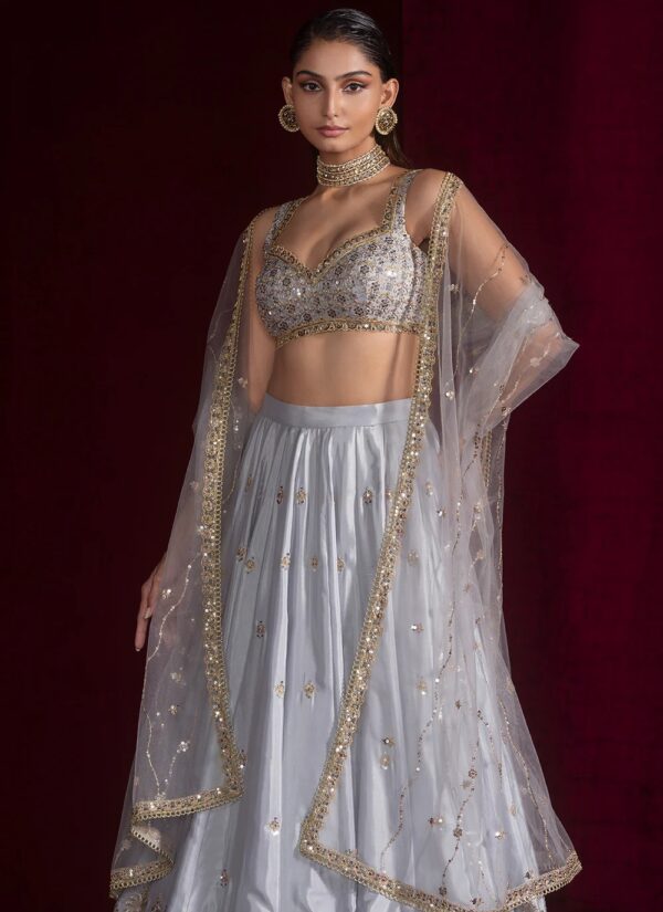 Silver party wear lehenga with net dupatta and heavy handwork satin silk fabric