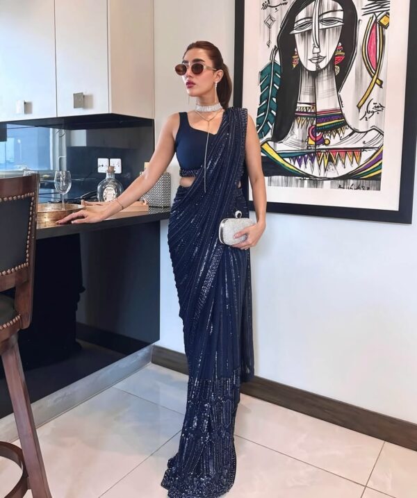 Blue georgette saree with sequins thread and dori work detail