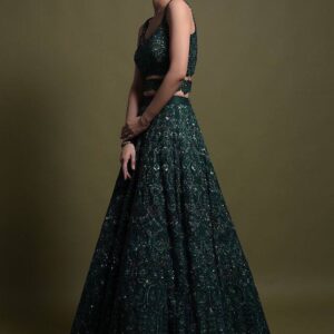 Emerald green net lehenga with sequin thread and dori work