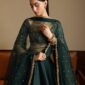 Emerald green malai satin lehenga set with net dupatta stone work