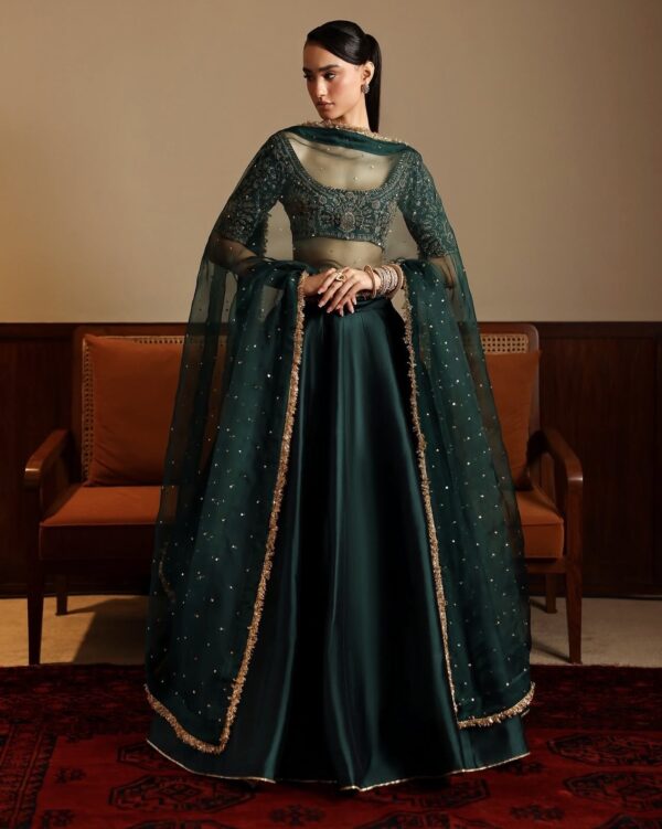 Emerald green malai satin lehenga with 4.5 meter flair and can can