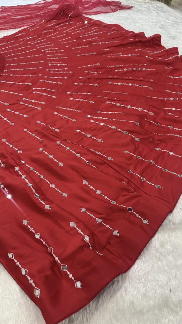 Heavy flare mirror work lehenga set with can can attached