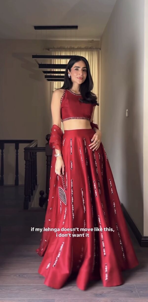 Crimson Heartbeat Mirror Work Lehenga Set – Front Look Crimson red mirror work lehenga set in Malai satin silk with heavy flare