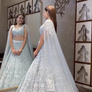 Lightweight pastel bridal lehenga with heavy embroidery