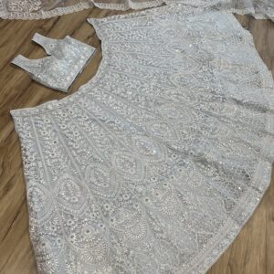 Ice blue sequin lehenga with net blouse and dupatta