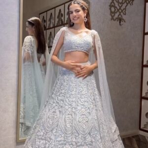 Pastel blue net lehenga with 3.25 meter flair and can can bridal outfit