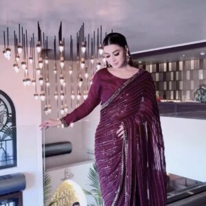 Heavy sequin wine saree for wedding and reception look