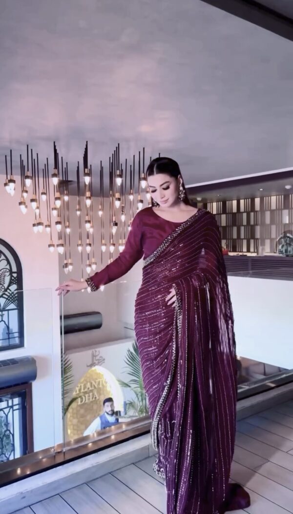 Heavy sequin wine saree for wedding and reception look